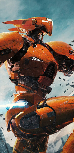 Orange Pacific Rim Jaeger robot standing in battle stance with debris in the background