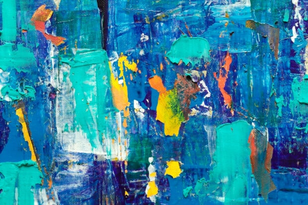 Vibrant paint texture with blue and teal tones in an abstract style