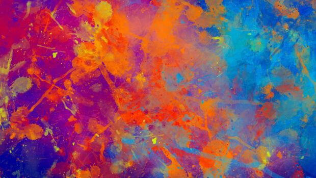 Abstract paint splatter with vibrant colors blending into an artistic display