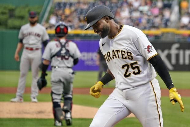 A Pittsburgh Pirates player celebrating during a baseball game on the field