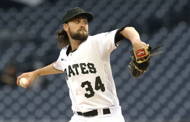 Pittsburgh Pirates player pitching during a baseball game in a stadium