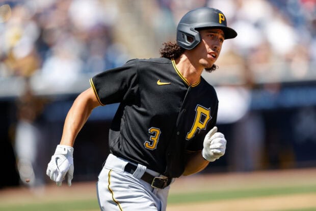 Pittsburgh Pirates player running during a baseball game in a black uniform with number 3