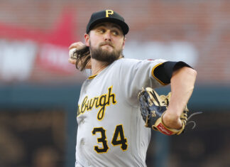 Pittsburgh Pirates player wearing jersey number 34 pitching on the field