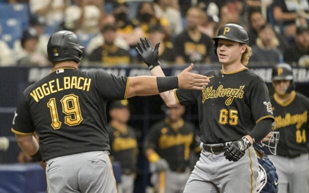 Pittsburgh Pirates players celebrating during a baseball game on the field