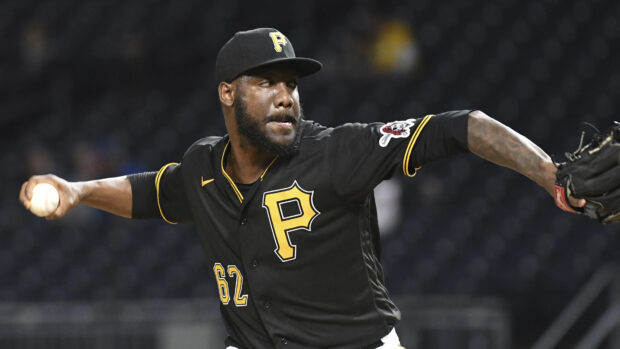 Pittsburgh Pirates player pitching a baseball during the game