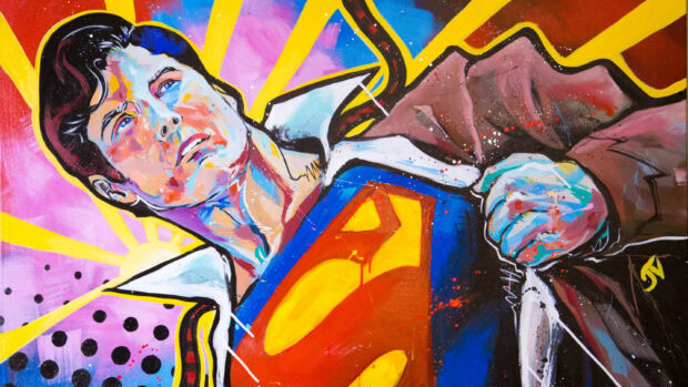 A colorful pop art painting of a superhero opening his shirt to reveal a vibrant emblem on his chest