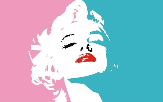 Pop art portrait of a woman with red lips and contrasting blue and pink colors