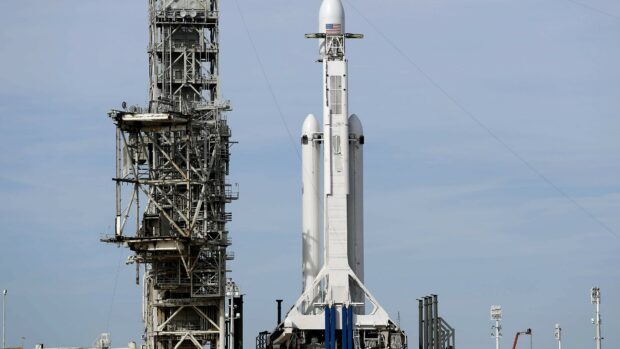 SpaceX Falcon Heavy rocket on launch pad at space center