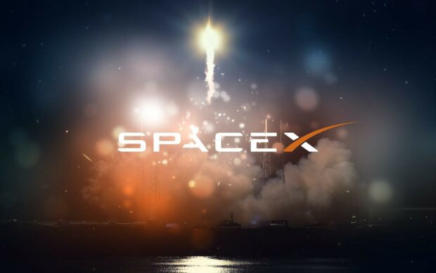 Rocket launch showcasing spacex in a night sky with bright flames and smoke clouds