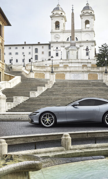 Elegant car parked near the Spanish Steps in Rome during the day