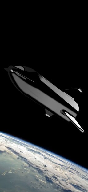 A starship flying above the earths atmosphere in space