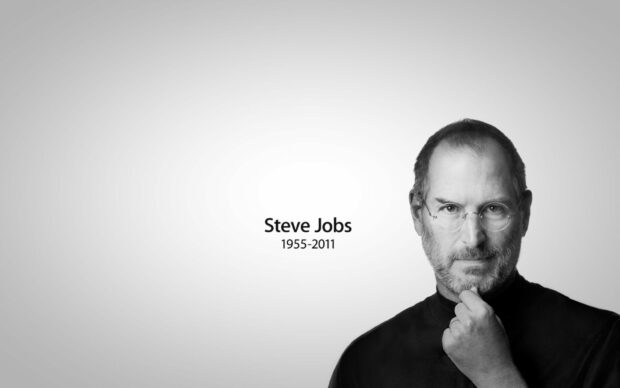 Steve Jobs portrait with a thoughtful expression and beard in black and white HD quality