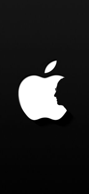 The silhouette of Steve Jobs is integrated with the Apple logo in this dark wallpaper design