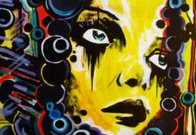 Abstract colorful street art painting with expressive face and artistic details
