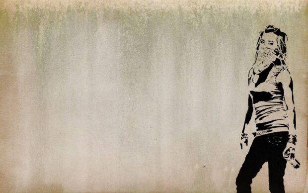 Girl stencil art with bandana holding spray can on textured wall