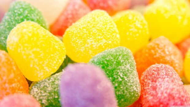 Close up of colorful sugar coated sweets in vibrant colors