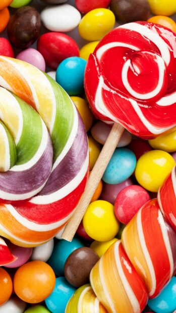 Colorful sweets with lollipops and candy pieces in bright colors