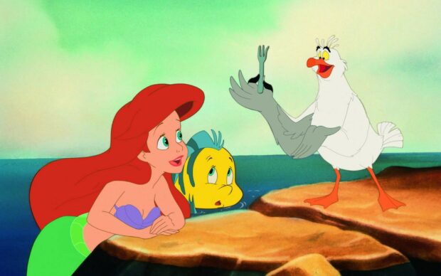Ariel looking at a seagull holding a fork near a yellow fish in the ocean
