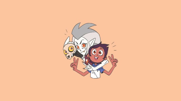 Luz and Eda from The Owl House posing happily with a skull mask on a peach background