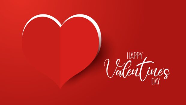 Red heart symbol with happy valentines day text on red background design for valentine