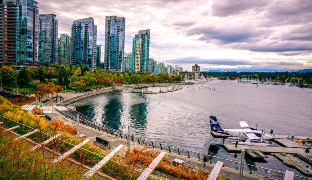 A vibrant view of Vancouver cityscape showcasing modern buildings and waterfront in Canada