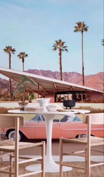 A vintage car and modern furniture set with palm trees in Palm Springs desert