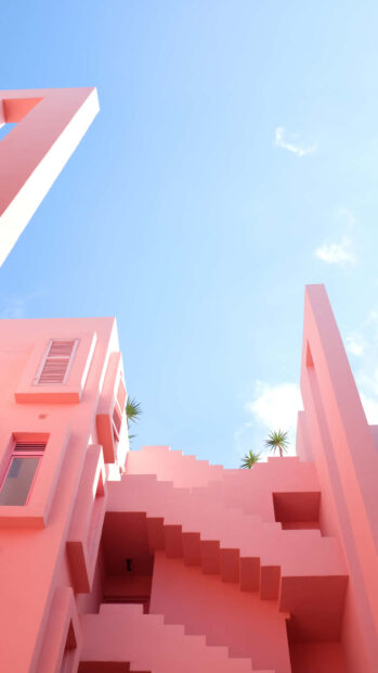 Pink pastel summer architecture with staircases under clear blue sky