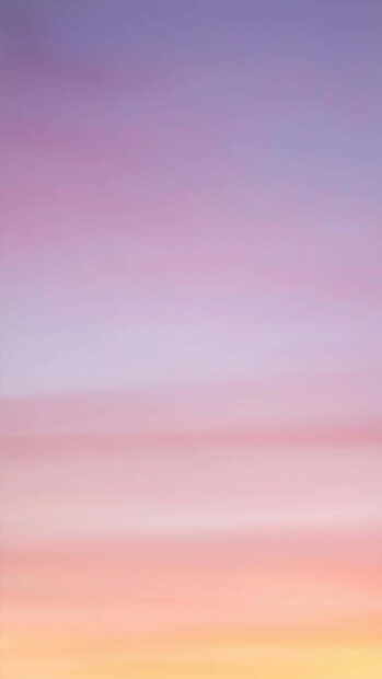 Soft pastel summer sky gradient with pink purple and orange tones