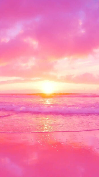 Pink summer scene with ocean waves and glowing sunset colors