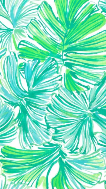 Green tropical leaves pattern in vibrant shades of blue and green