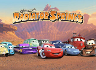 Colorful Radiator Springs characters gathered in a desert setting with rocky mountains in the background