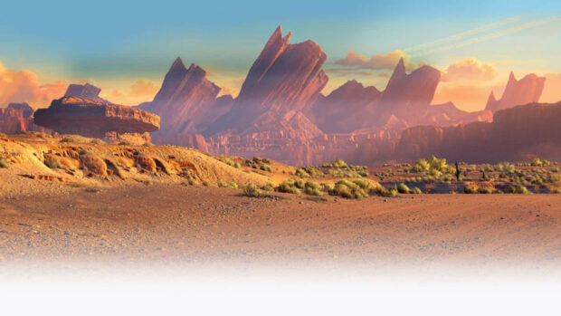 Radiator Springs landscape showcasing rocky formations and desert terrain at sunset
