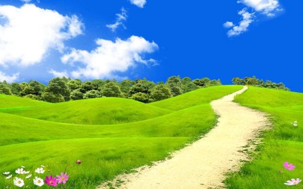 A vibrant spring landscape with green hills and a winding path under a clear blue sky