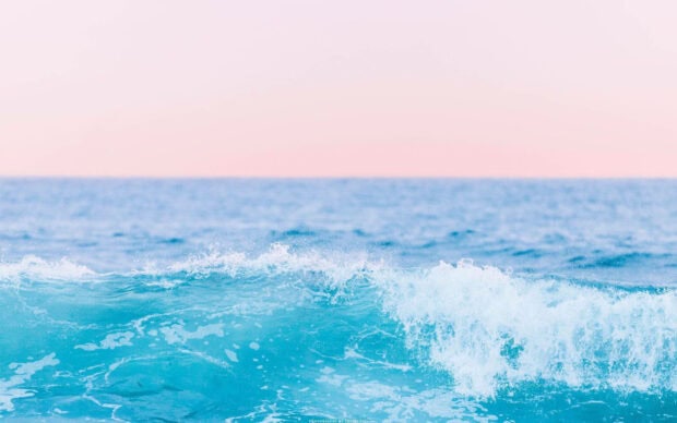 Calm turquoise ocean waves during summer aesthetic