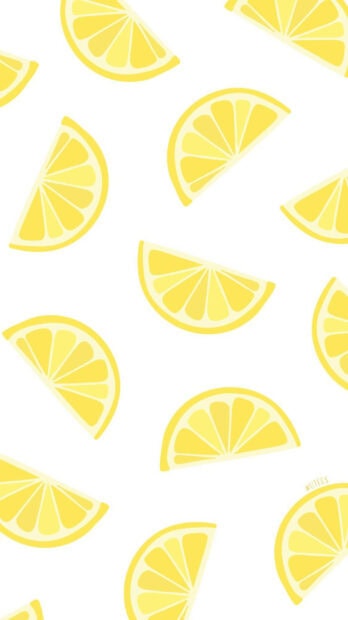 Bright lemon slices pattern on white background with summer aesthetic