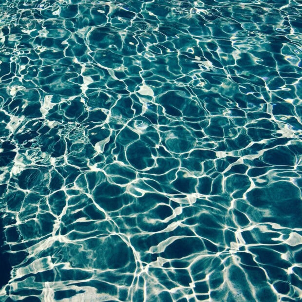 Clear water reflections create a summer effect in the pool