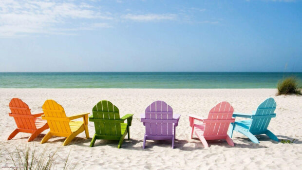 Colorful chairs on the beach with summer sea view
