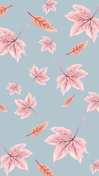 Watercolor leaves gently drift and scatter across a soft blue background