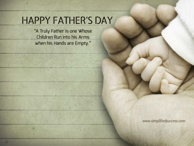Adult hand cradles a baby's tiny hand, while text on the left displays a Happy Father's Day greeting and an emotional quote