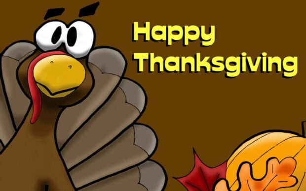 A cartoon turkey peeks from the left, a pumpkin section and a red maple leaf appear from the bottom right, celebrating the holiday