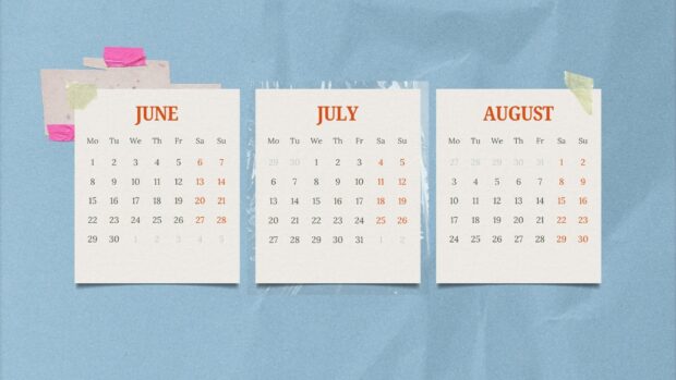 A realistic 2026 July Calendar Desktop Background showing three calendar pages (June, July, August) taped onto a textured blue surface