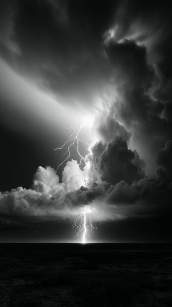 Black aesthetic wallpaper showing a dramatic black and white lightning strike illuminating dark storm clouds over a horizon