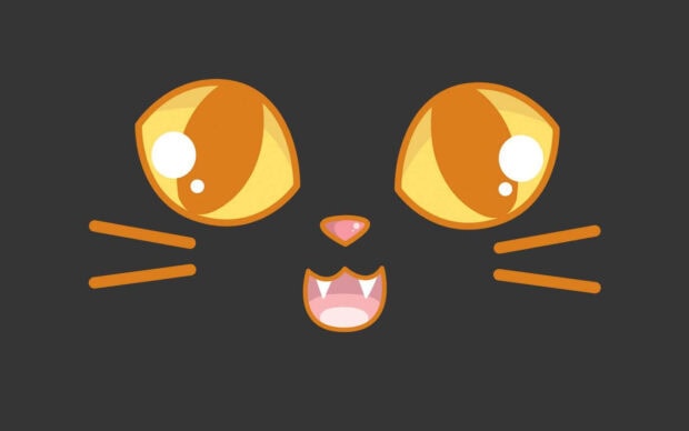 A cute black cat Halloween wallpaper featuring a cartoon black cat face with huge orange eyes and fangs on a dark background