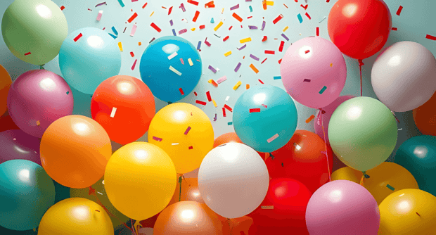 A cheerful Birthday Wallpaper filled with many colorful balloons and scattered confetti
