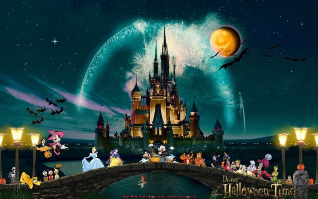 A cute Disney Halloween wallpaper showcasing a spooky castle, Mickey and friends, princesses, and villains gathered on a bridge under a pumpkin moon