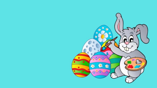 A cheerful Easter Bunny Wallpaper showing a cartoon bunny painting colorful Easter eggs on a light blue background