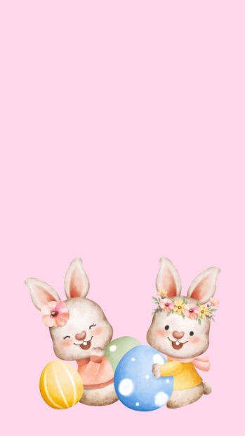 A delightful Easter Bunny Wallpaper showcasing two cute cartoon bunnies with flower crowns holding colorful Easter eggs against a soft pink background