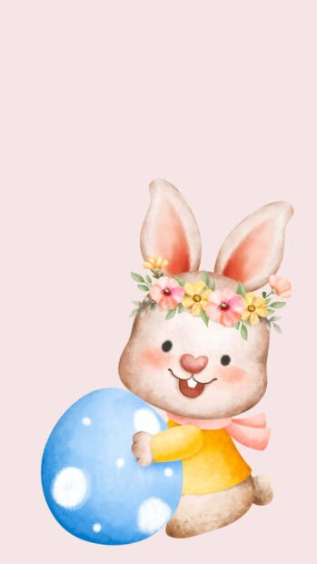 A cute Easter egg wallpaper featuring a cartoon bunny wearing a flower crown and holding a blue polka-dotted egg