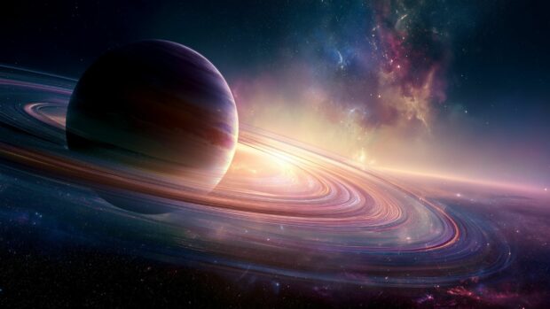 Galaxy Wallpaper showing a majestic ringed planet floating in space with a colorful nebula and stars in the background