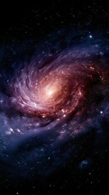 A beautiful Galaxy Wallpaper showing a spiral galaxy with a central glow against a dark cosmic background